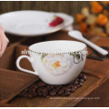 ceramic colored coffee cup and saucer